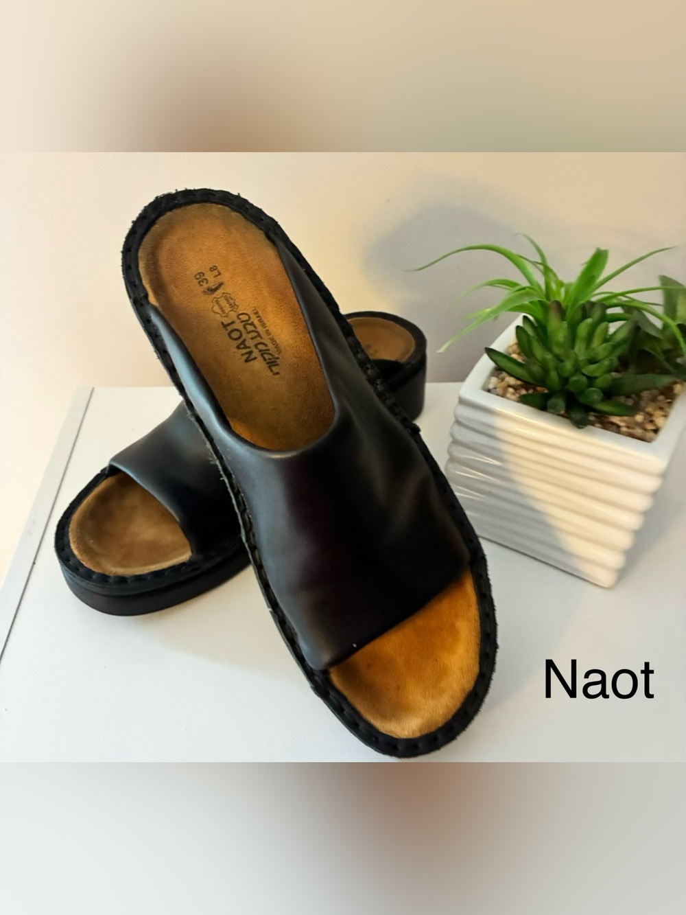 NAOT “Rome” Black Leather Slide Mules with Tan Footbed